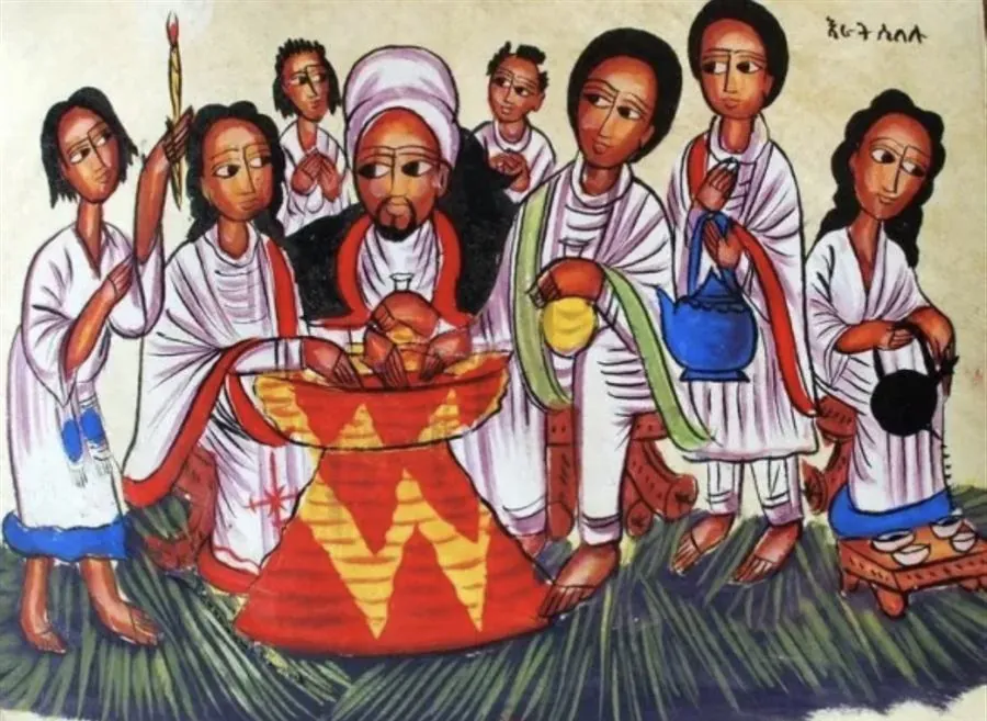 Family gathered around a traditional mesob basket